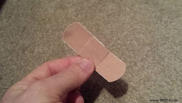 How to Make a Bandage Stick on Your Fingertip Longer. 