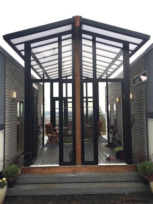 This Beautiful House Is Actually Made Up Of Two Tiny Houses Connected To Each Other By A Veranda. 