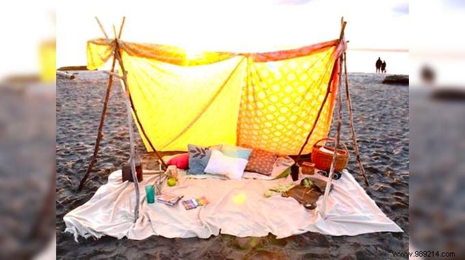 Poles + Old Sheet =A Gorgeous Bohemian Beach Tent! 