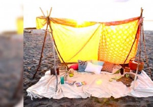 Poles + Old Sheet =A Gorgeous Bohemian Beach Tent! 