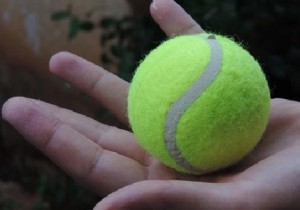 Why do I put 2 tennis balls in my washing machine? 