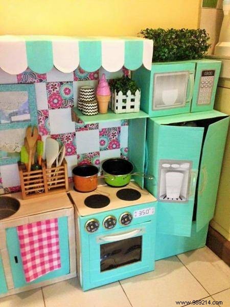 How to Make a Mini Cardboard Kitchen for Your Toddler. 