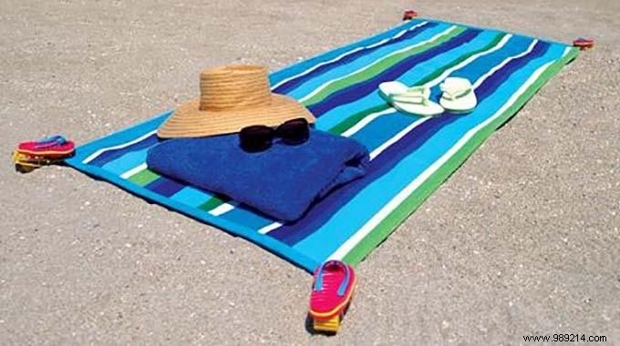 The trick to stop your beach towel from blowing away. 