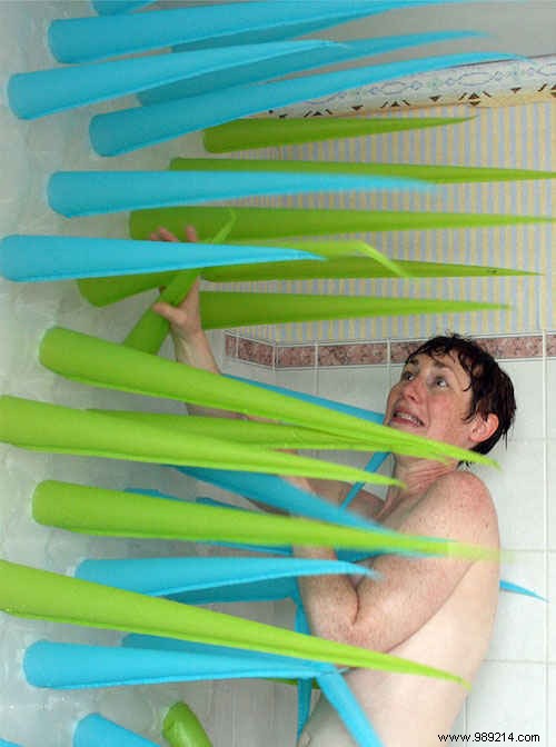 The Shower Curtain That Kicks You Out of the Shower After 4 Mins. 