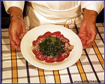 Argentinian torillon carpaccio with hazelnut and black sesame, small salad of fresh herbs 