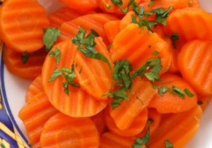 Flank steak with mustard butter and Vichy carrots 