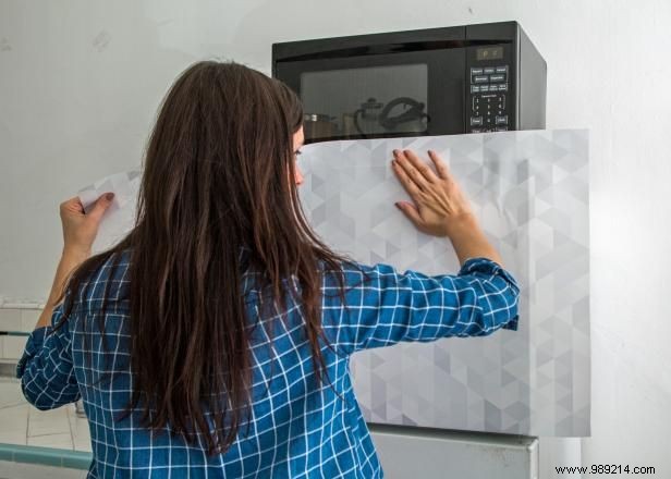 How to cover a refrigerator with removable wallpaper