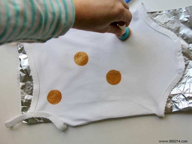 How to Paint Polka Dots on a Baby Onesie