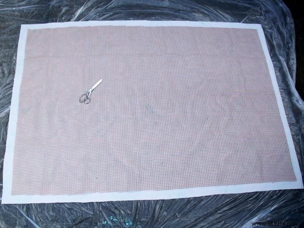 How to turn a canvas cloth into an outdoor rug