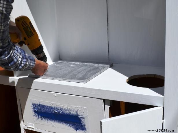 How to turn an old entertainment center into a play kitchen