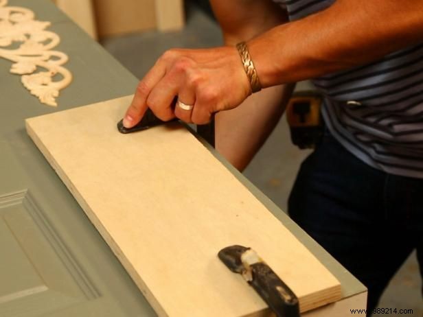 Make a French country headboard out of old doors