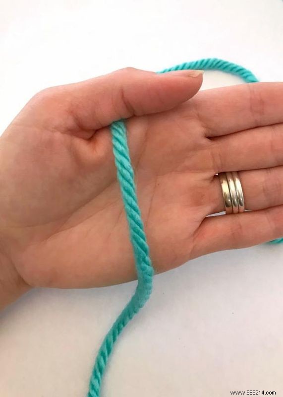 No knitting needles are required to make this hand knit necklace