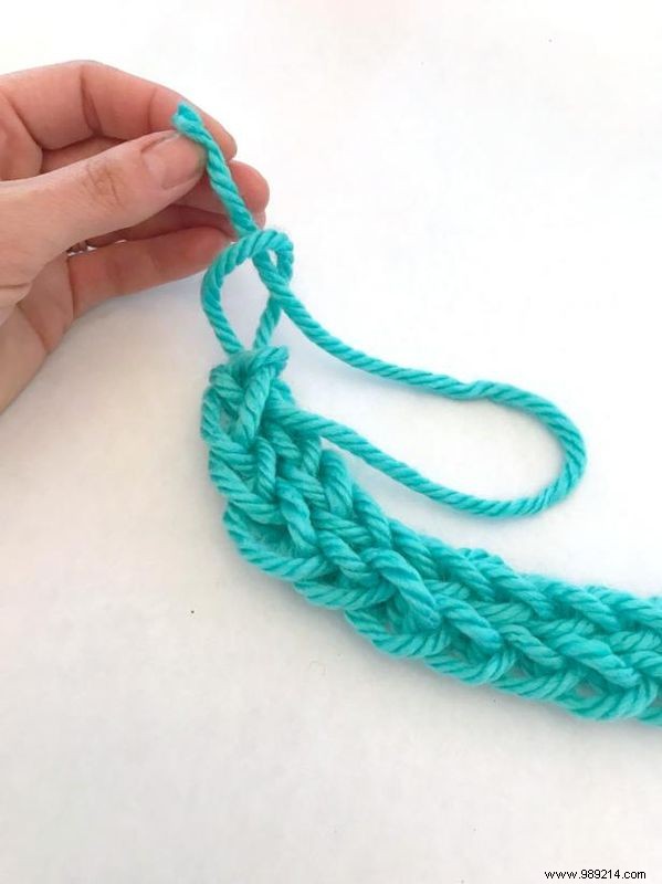 No knitting needles are required to make this hand knit necklace