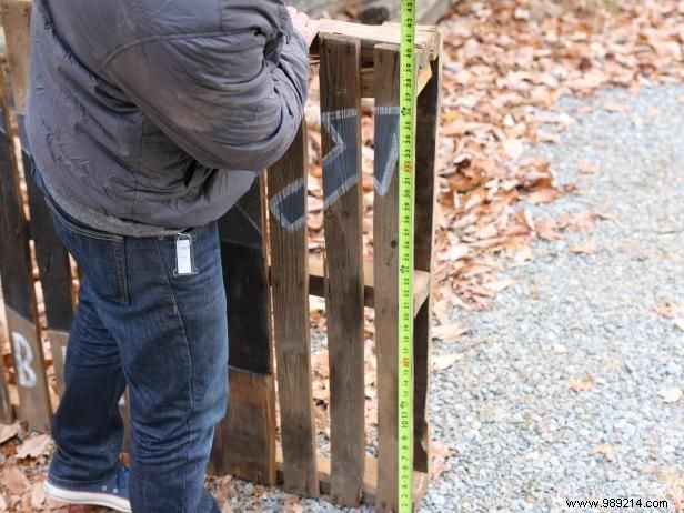 Use a shipping pallet to create outdoor patio art or a custom sign